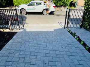 Paved driveway with motorised driveway