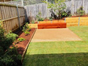 Treated pine garden bed retaining wall