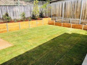 Treated timber garden retaining wall