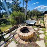 Fire pit with custom bath tub seat