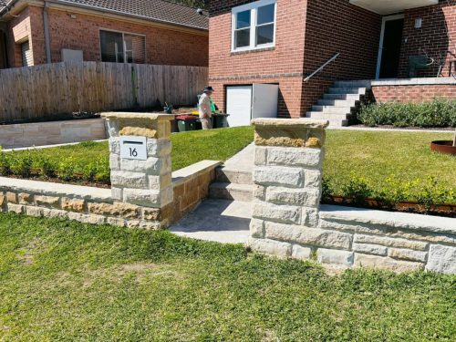 front entrance sandstone fence piers