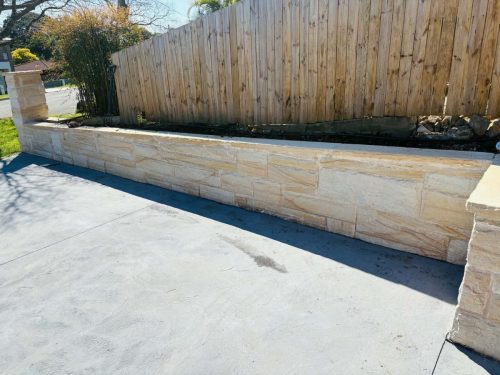 sandstone retaining wall garden bed